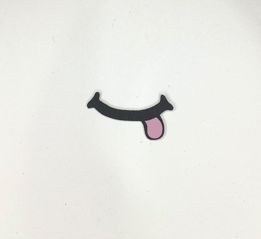 a sticker of a tongue sticking out of the side of a wall
