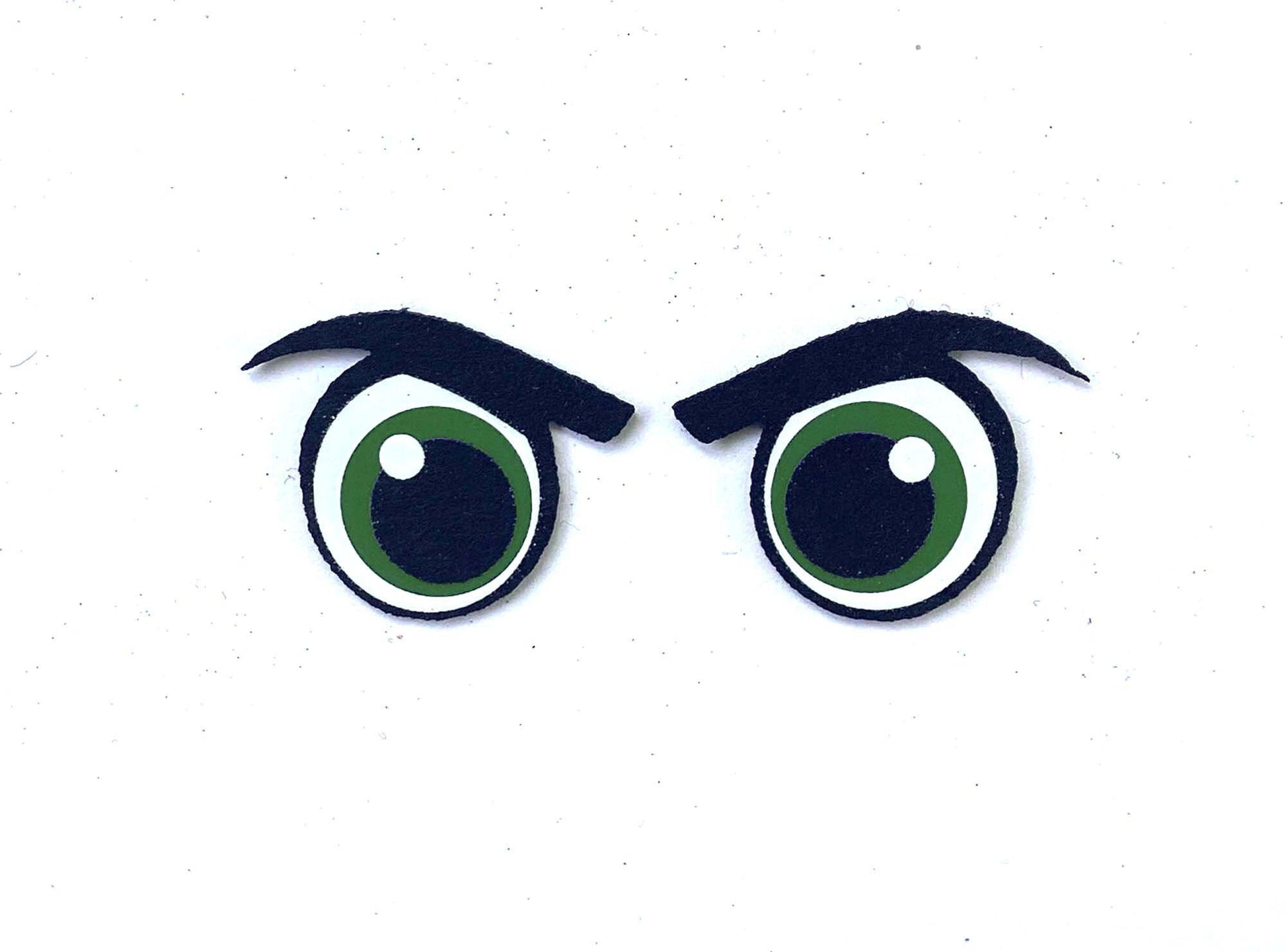 a close up of a pair of green eyes