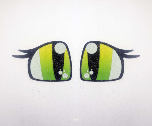 a pair of green eyes with black and white stripes